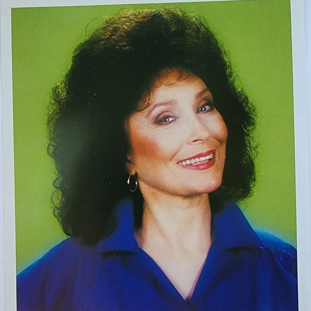 four 8x10 loretta lynn prints